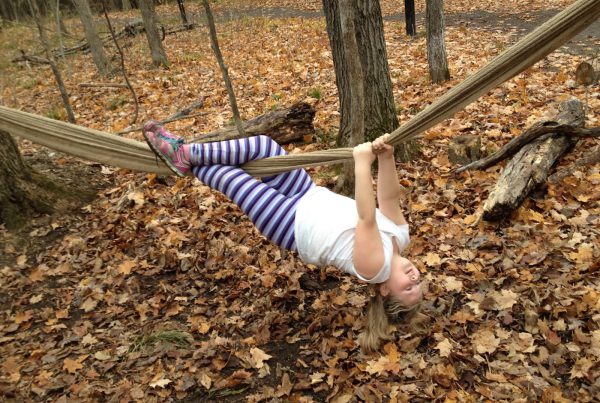 kid hanging upside down